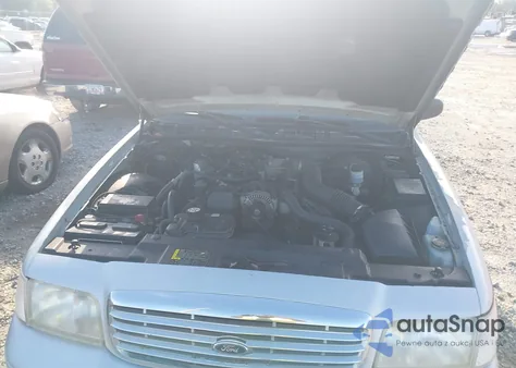 2003 Ford Crown Victoria Standard z USA, uszkodzony, nr VIN 2FAFP73W03X182860